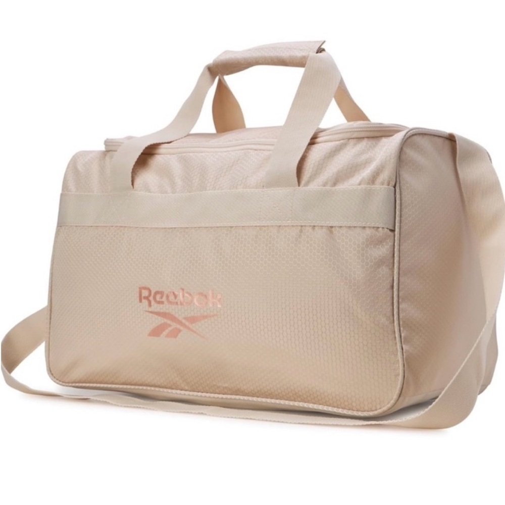 NWT/PACKAGED Reebok Pink/Rosegold Warrior ll Duffel Bag with Adjustable Strap